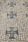 Tomar, Portugal. Traditional cobblestone sidewalk but with Templar crosses. Art Print